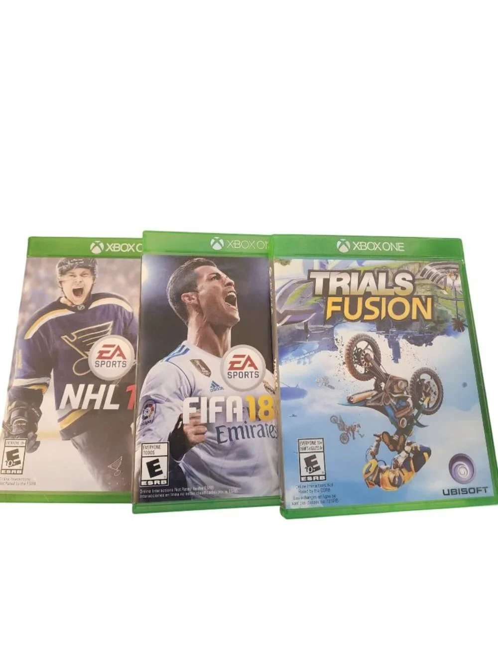Xbox One 3 games bundle Trials Fusion FIFA 18 NHL 17 soccer hockey videogames